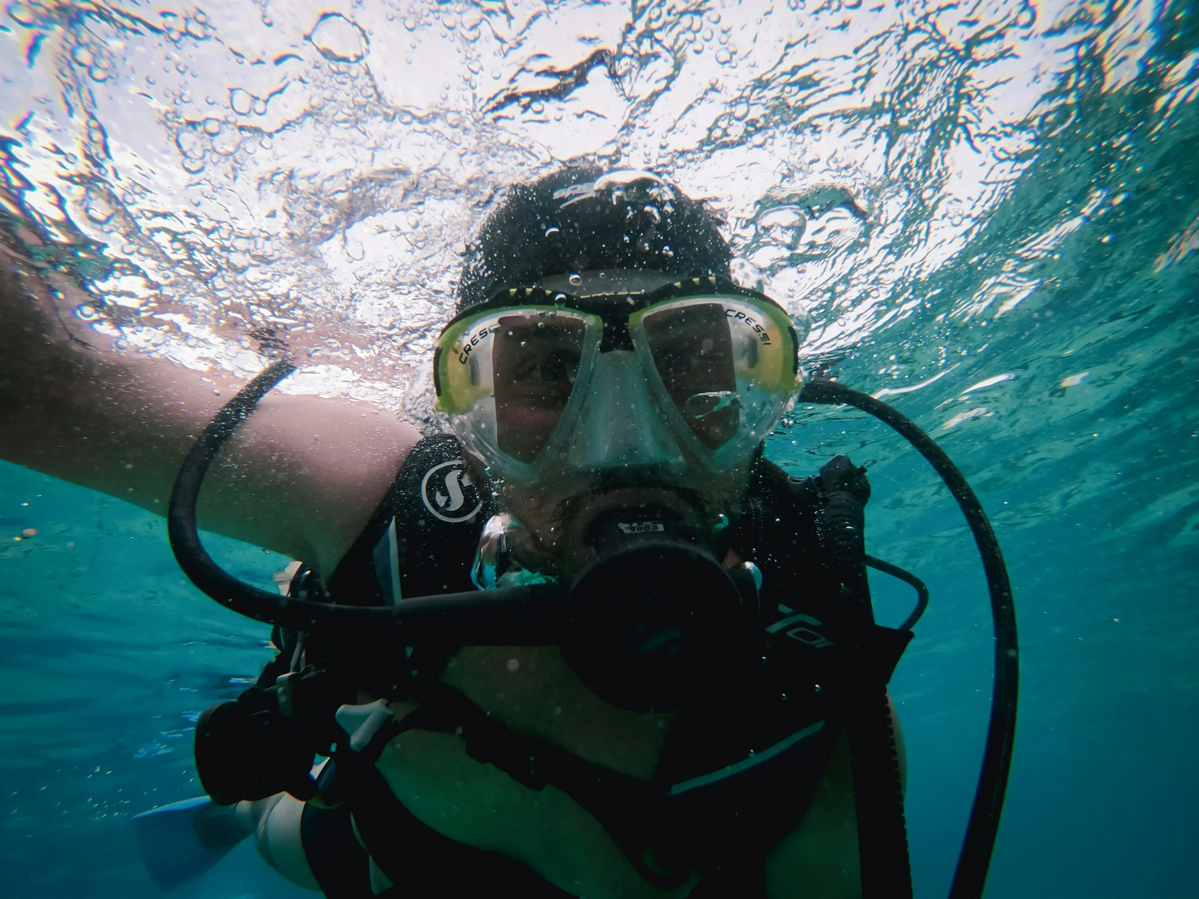 Scuba diving student practicing skills underwater